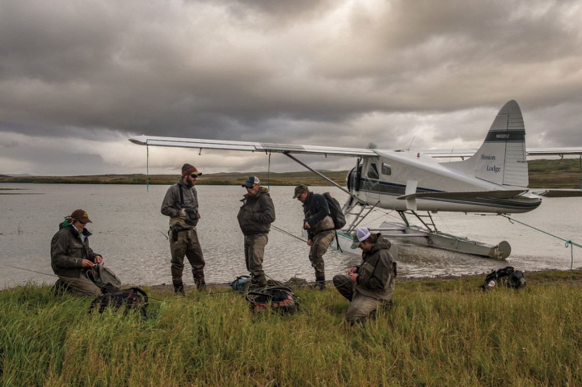 Fly-in anglers out of Mission Lodge prepare for a day on a river in Katmai National Park in the Bristol Bay region.