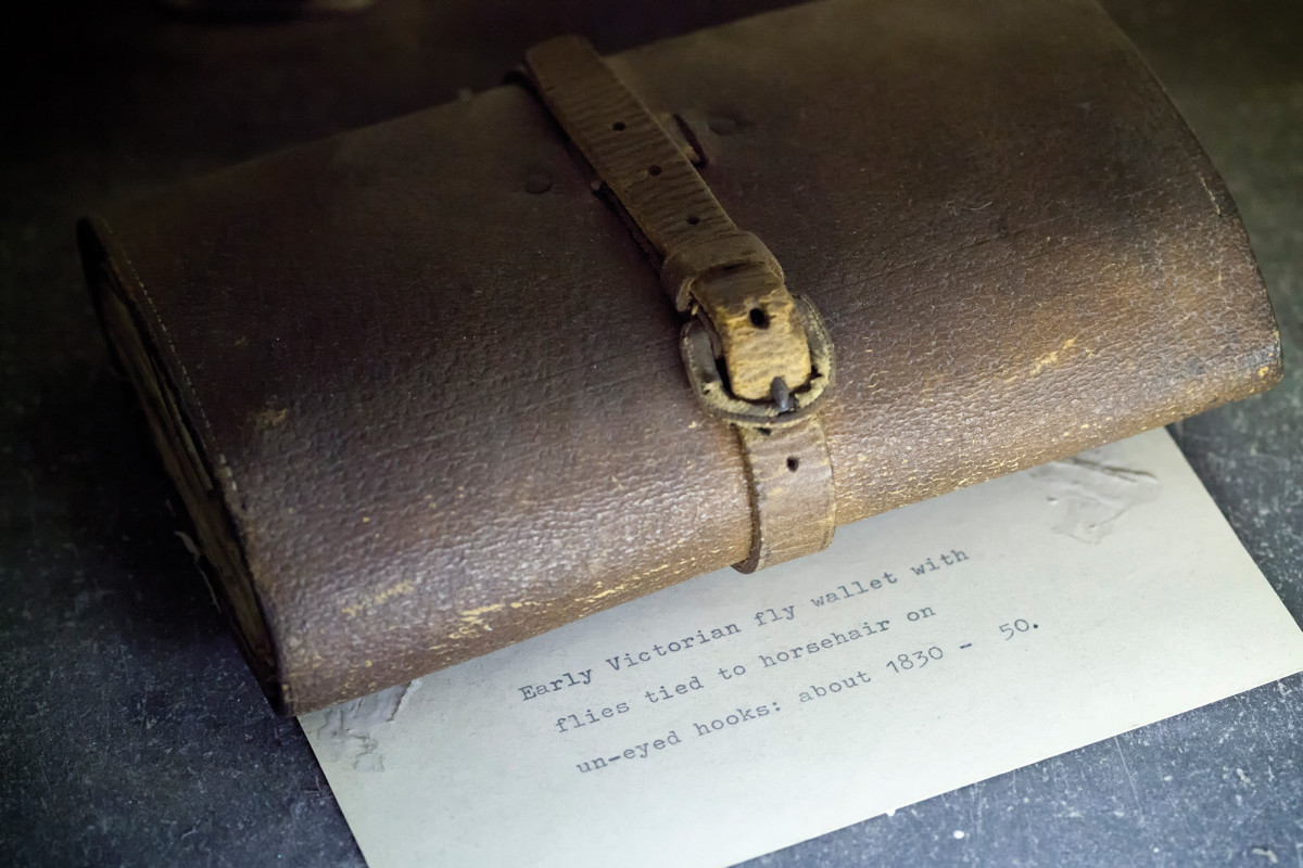 A Victorian era fly wallet is displayed in a case in the hotel lobby.
